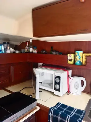 a microwave oven sitting on a counter in a kitchen at Velero Valencia Whimsy in Valencia