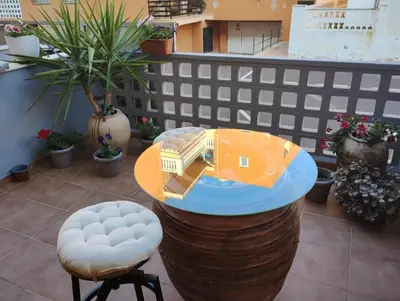 a table with a model of a house on it at Apartamento en la playa in Moncófar