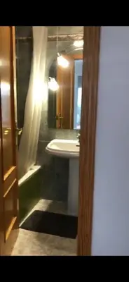 a bathroom with a sink and a mirror at Apto 3 habitaciones, vistas al mar Moncofar Grao in Moncófar
