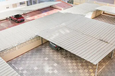 an overhead view of a parking lot with white roofs at Villamar ,ACC, playa wifi y garaje in Cullera