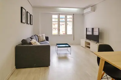 a living room with a couch and a table at PATRAIX FLAT in Valencia