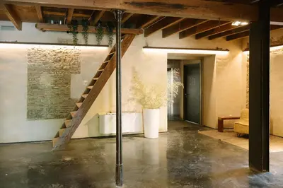 a hallway with a staircase in a building at Amazing suite by the fair in Valencia