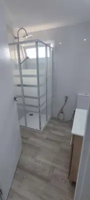 a bathroom with a glass door in a room at Naquera House & Pool in Náquera