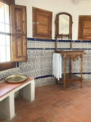 a bathroom with a sink and a mirror at Villa Torre, Valencia Spanje in Macastre
