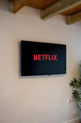 a netflix sign on the side of a wall at Loft Industrial Doble Altura in Valencia