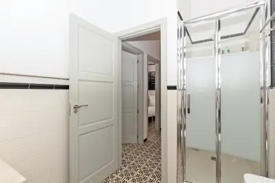 a bathroom with a shower and a glass door at GuestReady - A perfect stay in Ciutat Vella in Valencia