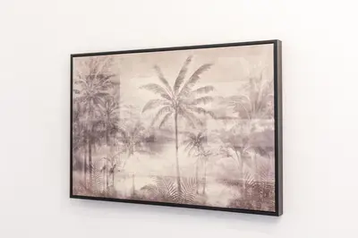 a framed drawing of palm trees on a wall at Mestalla Apartment Ideal for Mid-Term Stays in Valencia