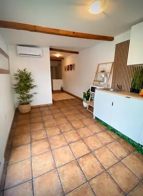 a kitchen with a tile floor in a room at Aire in Valencia