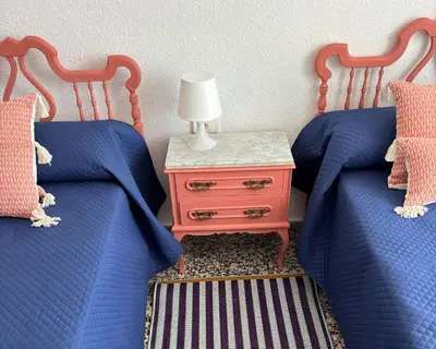 a living room with chairs and a couch and a table at Mediterranean House in Valencia in Valencia