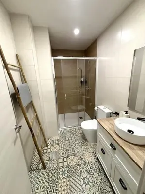 a bathroom with a shower and a toilet and a sink at Precioso apartamento en la playa in Valencia
