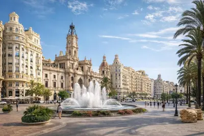 a fountain in front of a large building at Avakian Valencia Centro in Valencia