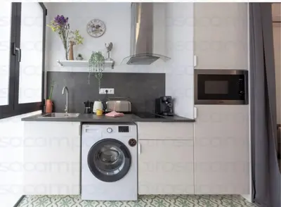 a kitchen with a washing machine and a sink at RC - Modern Valencia loft in Valencia