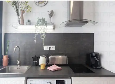 a kitchen with a sink and a counter top at RC - Modern Valencia loft in Valencia