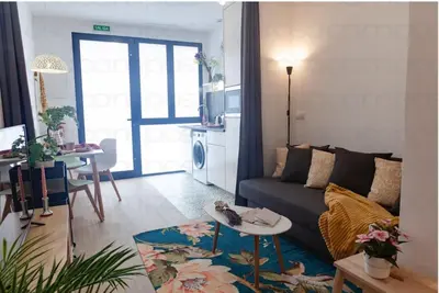a living room with a couch and a table at RC - Modern Valencia loft in Valencia