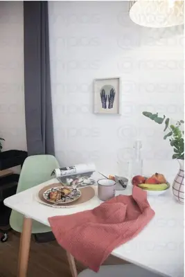 a white table with a plate of food on it at RC - Modern Valencia loft in Valencia