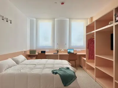 a small kitchen with a sink and a refrigerator at Valencia Tower in Burjasot