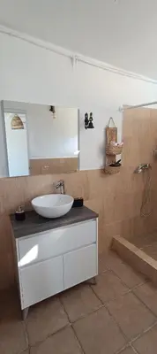 a bathroom with a sink and a bath tub at Ca la Yaya in Lliria