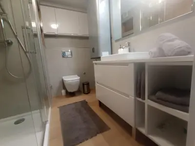 a bathroom with a shower and a sink and a toilet at Cullera Buena Vista Social Club con piscina y vistas al mar Solo Familias! in Cullera