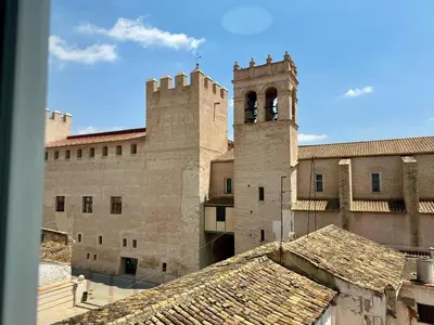 a view of a building with a clock tower at Vistas al Castell de Alacuas in Alaquas
