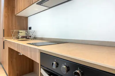a kitchen with a stove and a counter top at VLC HOST - Zapadores in Valencia