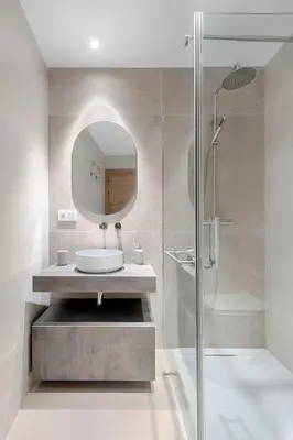 a bathroom with a sink and a shower with a mirror at Portal de Ruzafa 2 in Valencia