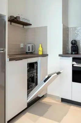 a kitchen with an open oven in the middle at Portal de Ruzafa 2 in Valencia