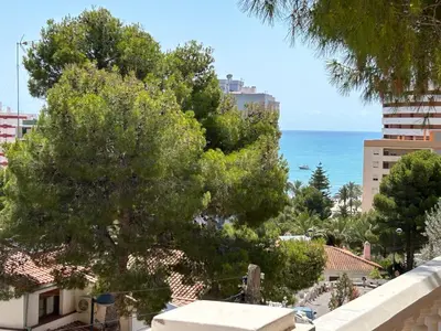 a view of the ocean from a building at Beauty Garden in Cullera