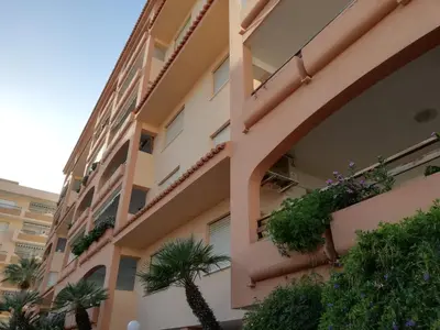 a building with plants on the side of it at Maripatri Solo Familias Serviplaya!!! in Casas Las Basas