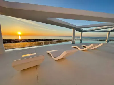 a view of the ocean from the roof of a house at 