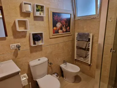 a bathroom with a toilet and a sink at Style Apartments City Center in Valencia