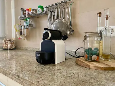 a kitchen counter with a mixer on a counter top at Cullera Valencia Escapada de ensueño in Valencia