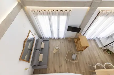 an overhead view of a living room with windows at ApartUP Ca La Leni Beach V in Valencia