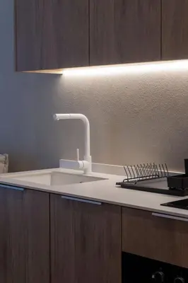 a kitchen with a white sink and a stove at VLC HOST - Molina del Palau in Valencia
