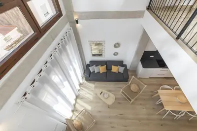 an overhead view of a living room with a couch at ApartUP Ca La Leni Beach IV in Valencia