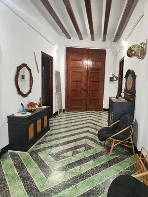 a room with a door and a carpeted floor at Casa Vistalmar in Cullera