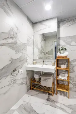 a bathroom with a sink and a mirror at New Apartment 1 ROOM,4 pax,wifi, ACRuzafa market in Valencia