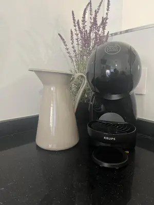 a coffee maker and a blender on a counter at Apartamentos ESPIGAS PUERTO in Valencia