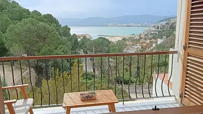 a balcony with a table and a view of the water at ROYAL BEACH - Appartment with sea view & terrace in Faro de Cullera