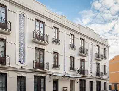 a white building with windows and balconies at BYPILLOW Sinfonía in Valencia
