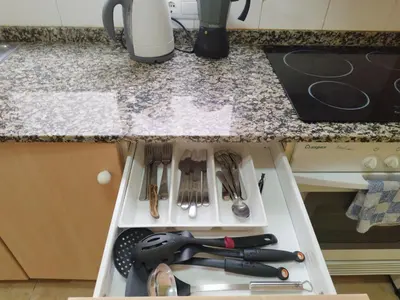 a drawer in a kitchen with utensils at Apartamento cerca del puerto deportivo 1 in Burriana