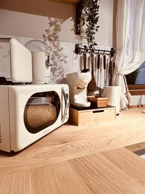 a white toaster oven sitting on top of a counter at Villa Valeria, Casa con Cueva privada del 1748 in Requena