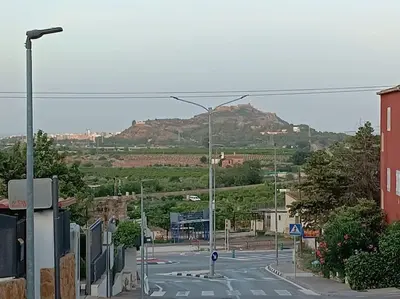 an empty street in a town with a street light at Gilet senderismo bici parking 20 min Valencia in Gilet