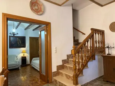 a living room with two couches and a table at A R Benjamín in Artana