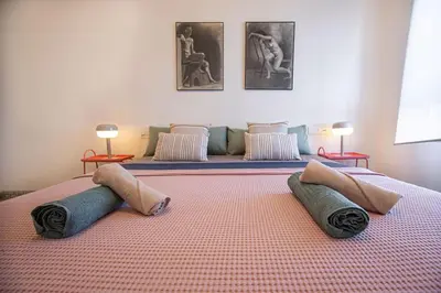 a room with two beds with pillows on it at Villa Azahar - Piscina - Barbacoa - Naturaleza in Valencia