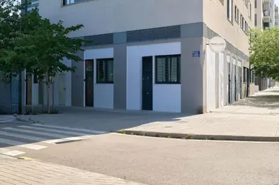 an empty street in front of a building at Romantic Apartment N3 Oceanografico Virkin Suites in Valencia