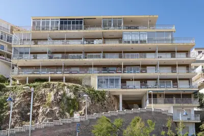 an apartment building on a hill with stairs in front at HAWAI, Esc-3, 3-16 in Faro de Cullera
