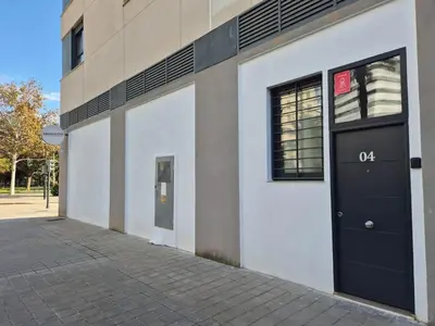 a building with a black door on the side of it at Romantic Apartment N.4 Oceanografico Virkin Suites in Valencia