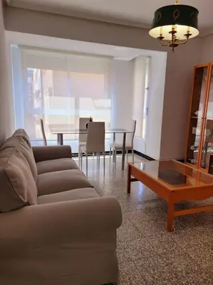 a living room with a couch and a table at Bella Morvedre in Sagunto