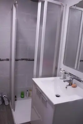 a bathroom with a sink and a shower with a shower at Flat close to beach perfect for families and groups - Actor Mauri 18 in Valencia