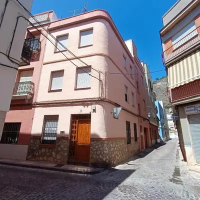 a building on the side of a street at Casa Central in Cullera